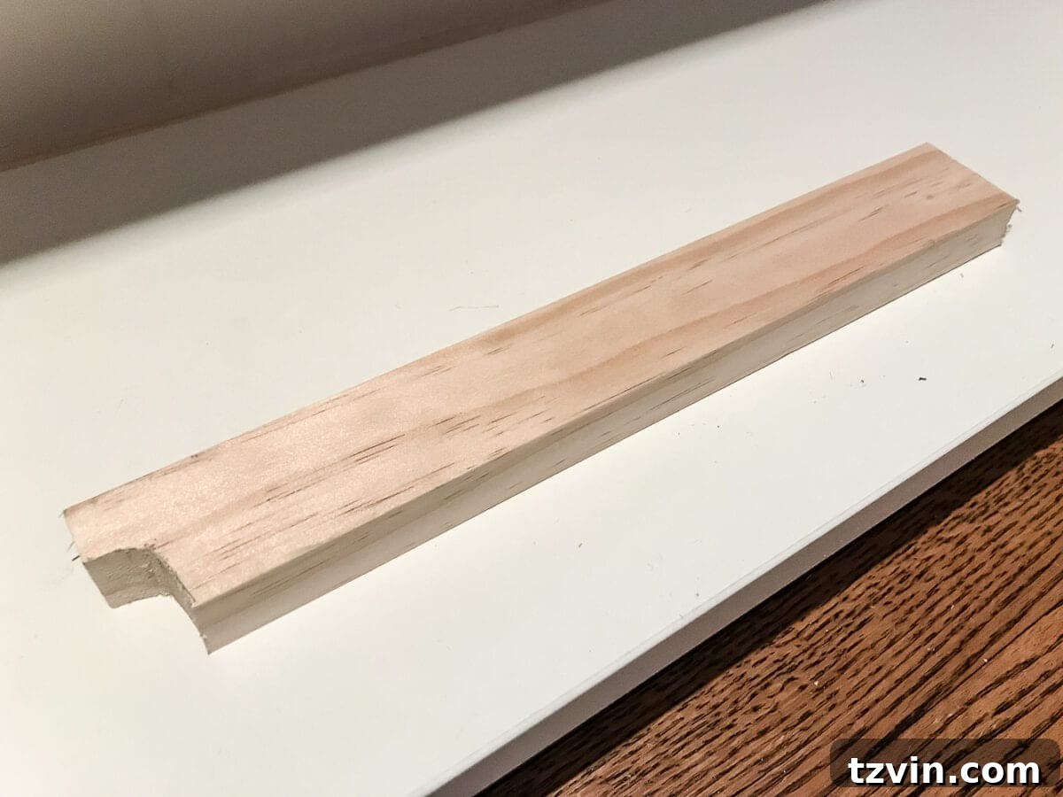Custom Playroom Library Corner 16 Notching a 1x2 board with a jigsaw to fit perfectly around floor trim for an IKEA Billy built-in.