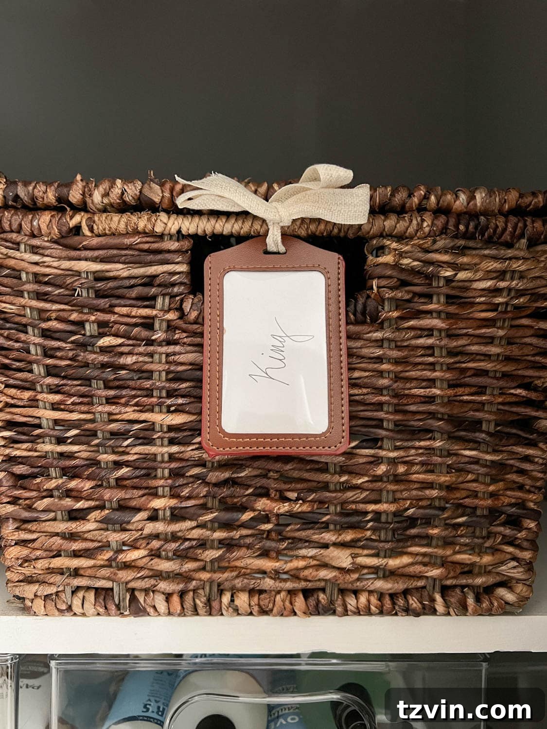 Flawless Bathroom Linen Closet Organization Ideas 12 sheet set storage in basket with lanyard label