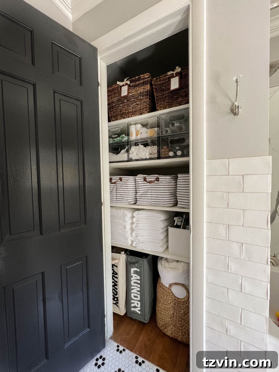Flawless Bathroom Linen Closet Organization Ideas 4 organized bathroom linen closet with bins, baskets, and towels