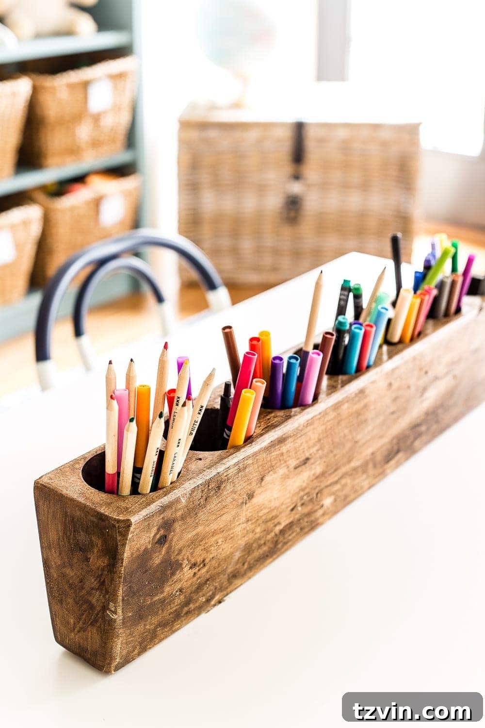Playroom Transformed: Brighter Spaces, Comfier Places 8 Vintage sugar mold repurposed as a colorful holder for markers and pencils in a playroom, adding unique character and organization.