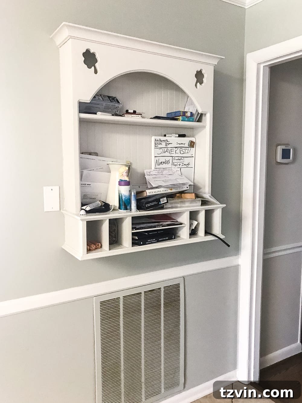 Organizing Your Family: Command Center Essentials 4 90s wall shelf in a kitchen with shamrock cut-outs