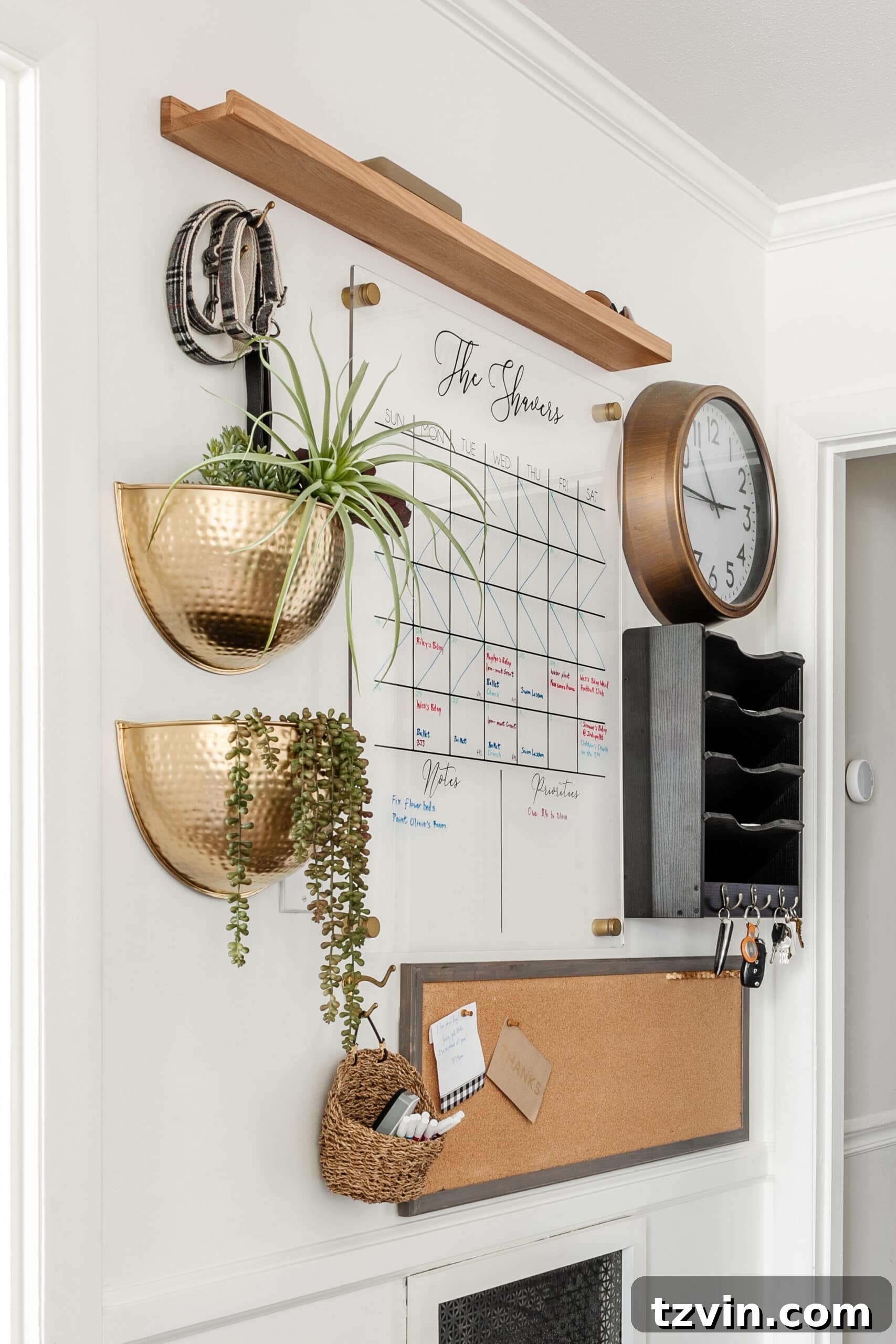 Organizing Your Family: Command Center Essentials 7 kitchen command center wall for family organization using calendar, mail sorter, key rack, and memo board