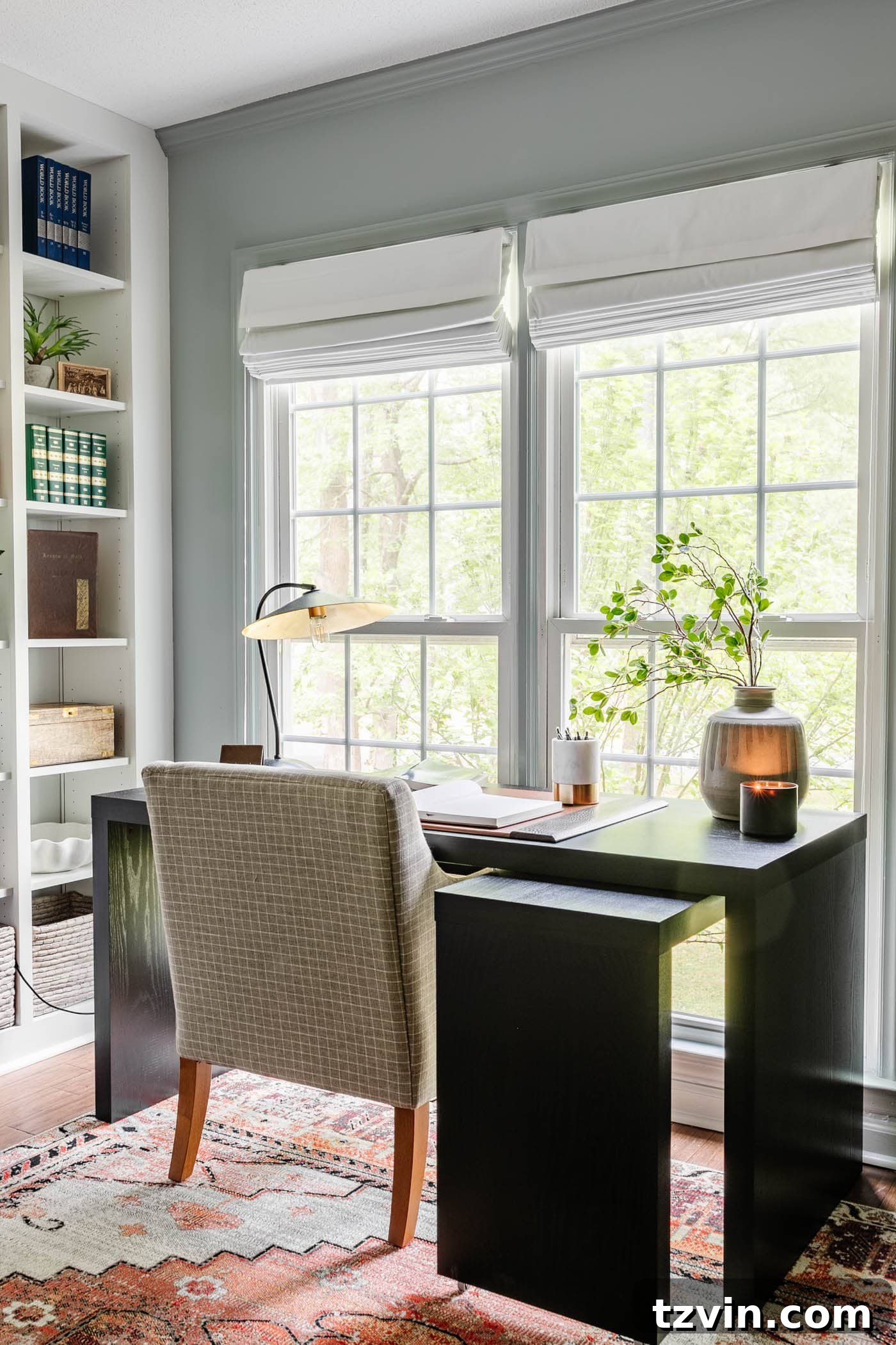 The Enduring Appeal of Classic Interior Design 21 A home office desk positioned by a window, featuring furniture with clean lines that contribute to a classic interior design aesthetic.