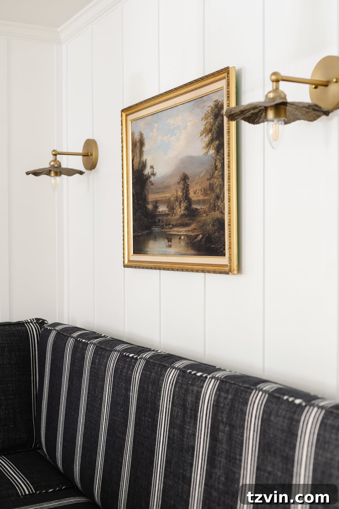 The Enduring Appeal of Classic Interior Design 25 A gilded picture frame encasing a vintage painting, serving as a classic and elegant piece of interior design.