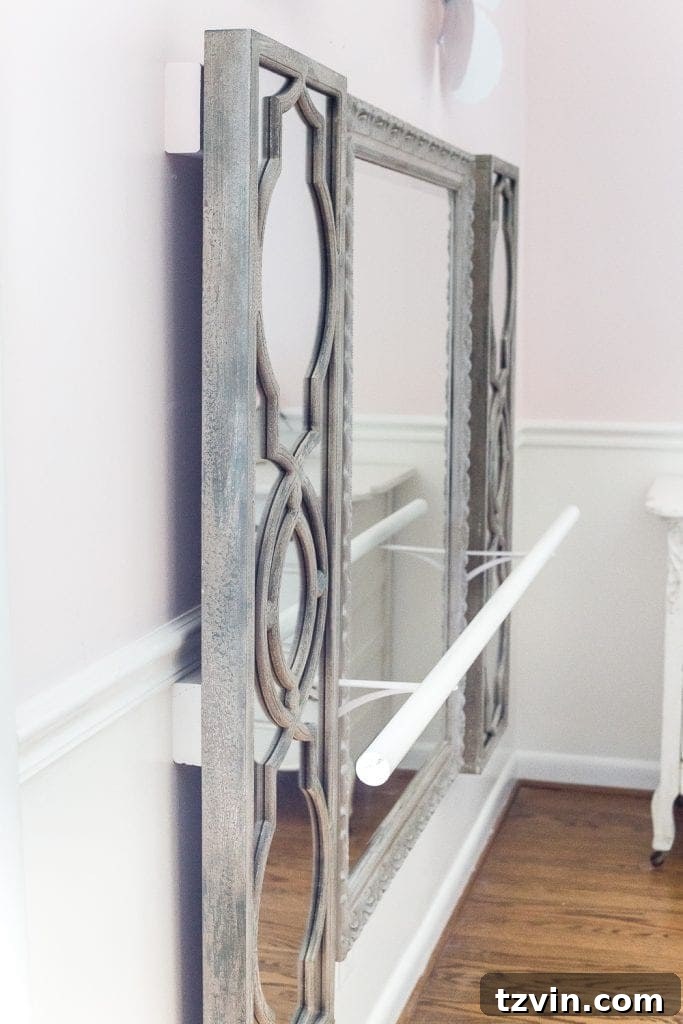 Crafting a Ballet Barre and Mastering Chair Rail Decor 7 Finished DIY ballet barre with mirrors in a vibrant girl's bedroom. Inspiring home decor for young dancers. #GirlBedroomDecor #BalletBarreHome #DIYInspiration #KidsSpace