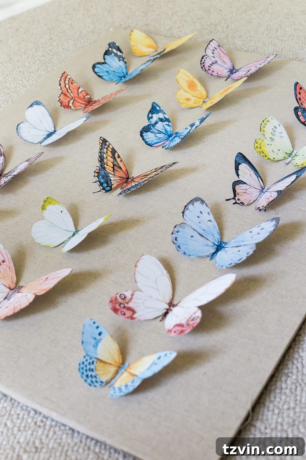Handcrafted Butterfly Exhibit Frame 6 Hot glue butterflies, creating a shadow box display, DIY wall art steps, secure paper crafts, artistic arrangement techniques, homemade decor