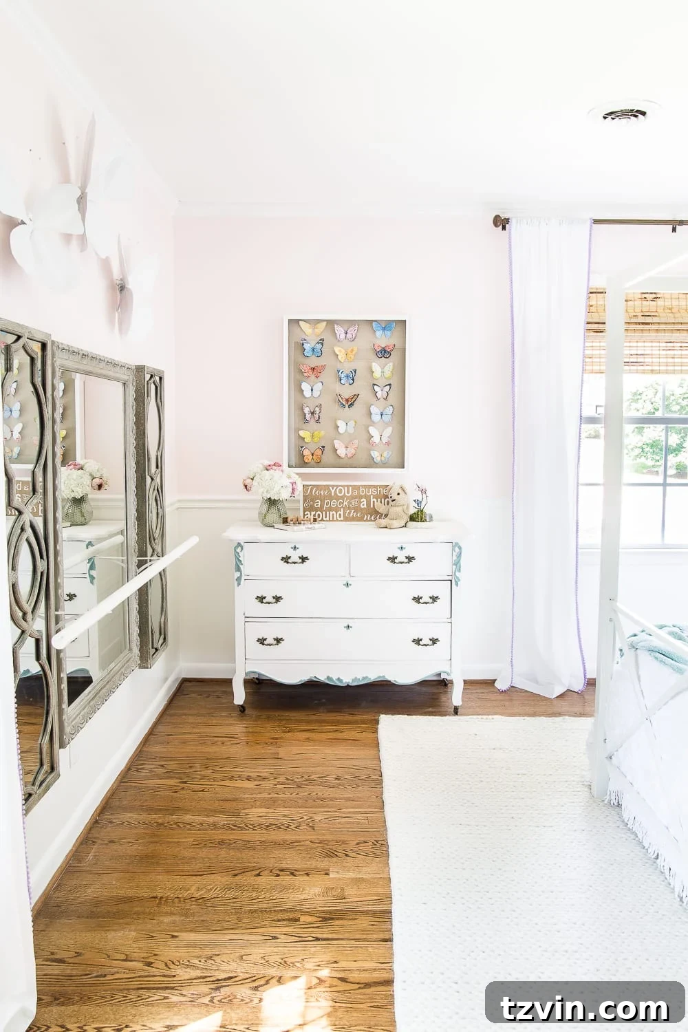 A little girl bedroom makeover with a butterfly theme full of thrifty makeovers, DIYable projects, and Anthropologie style knock-offs. #girlbedroom #littlegirlbedroom #girlroom #littlegirlroom #kidsspaces #kidsdecor #kidsroom #kidsdiy #bedroommakeover #kidsroommakeover #girlbedroommakeover