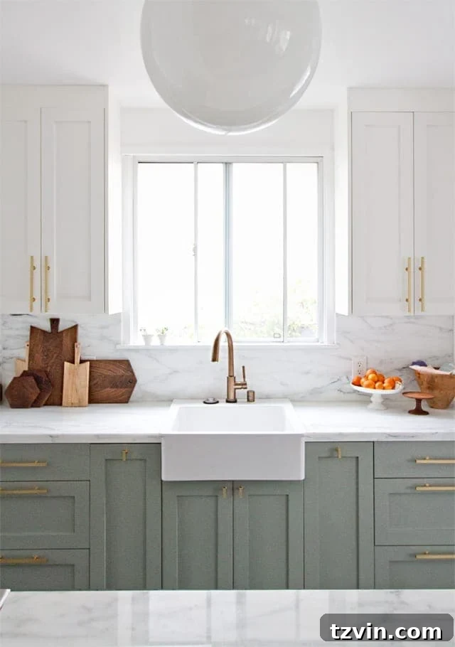Fresh Green Kitchen Cabinet Ideas 7 Farrow and Ball Pigeon cabinets, a beautiful muted green-gray, provide a calm and elegant kitchen aesthetic.