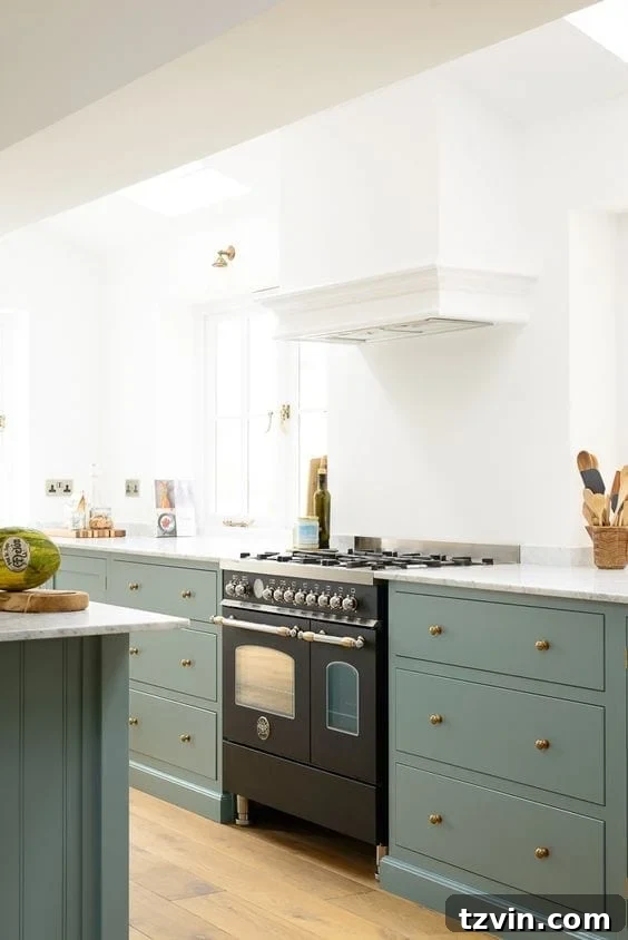 Fresh Green Kitchen Cabinet Ideas 8 Kitchen design showcasing DeVOL Trinity Blue cabinets, a rich blue-green that adds character and depth.
