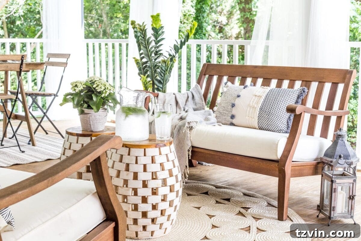 An inviting outdoor bench conversation set on the back porch, perfect for relaxing summer evenings.
