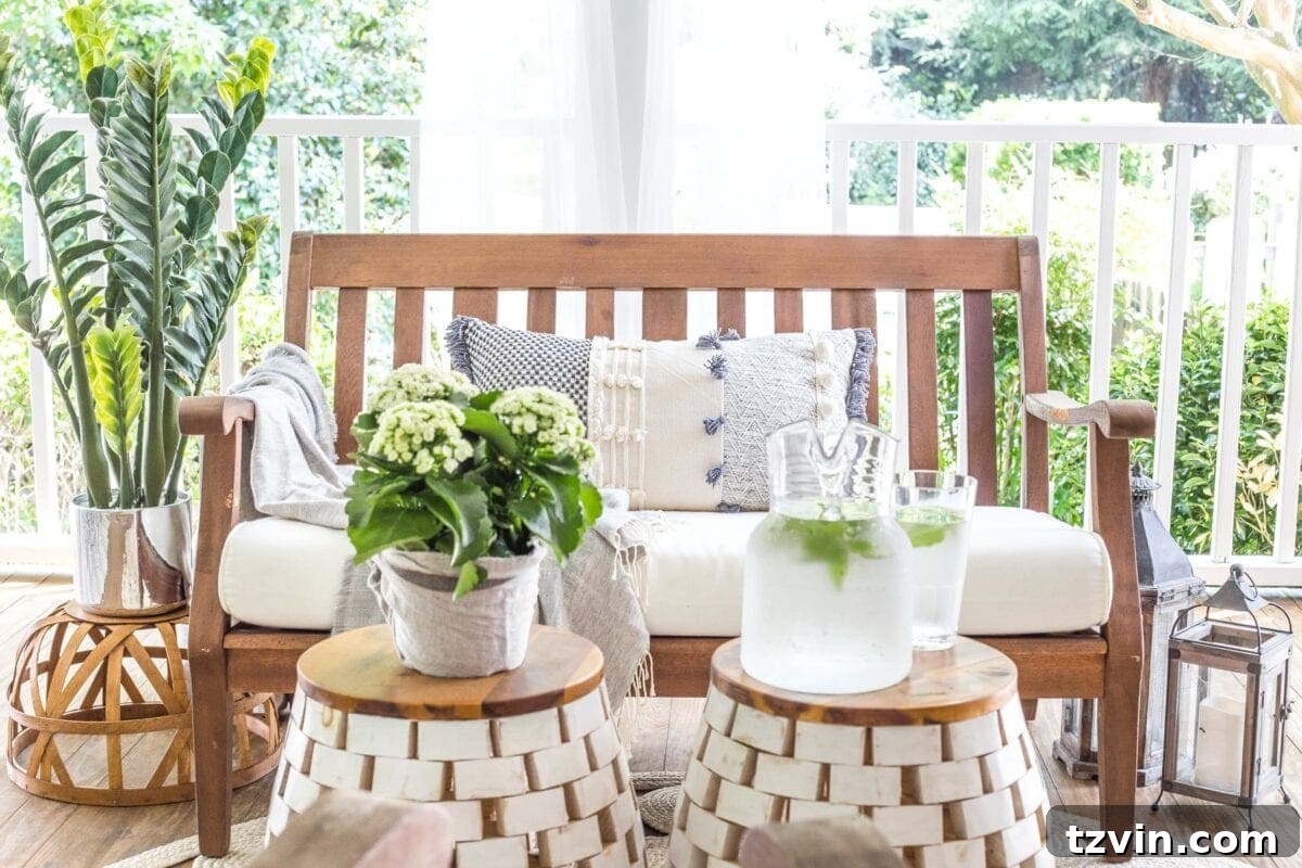 Stylish garden stools complement the summer back porch decorating scheme, offering versatile functionality.