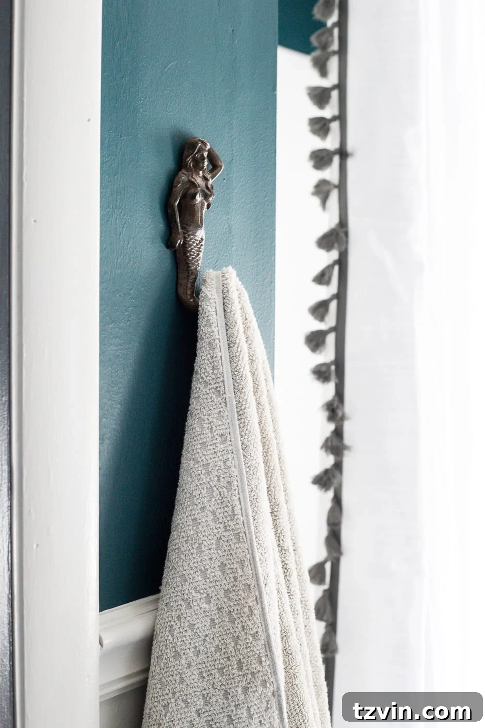 kid-friendly home - hooks for hanging up towels easily in the bathroom