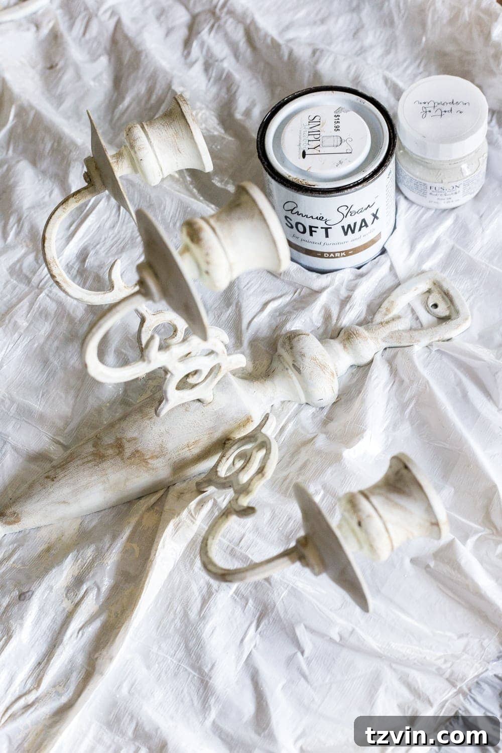 Chalk painted 80s brass to look like an antique French sconce during painting