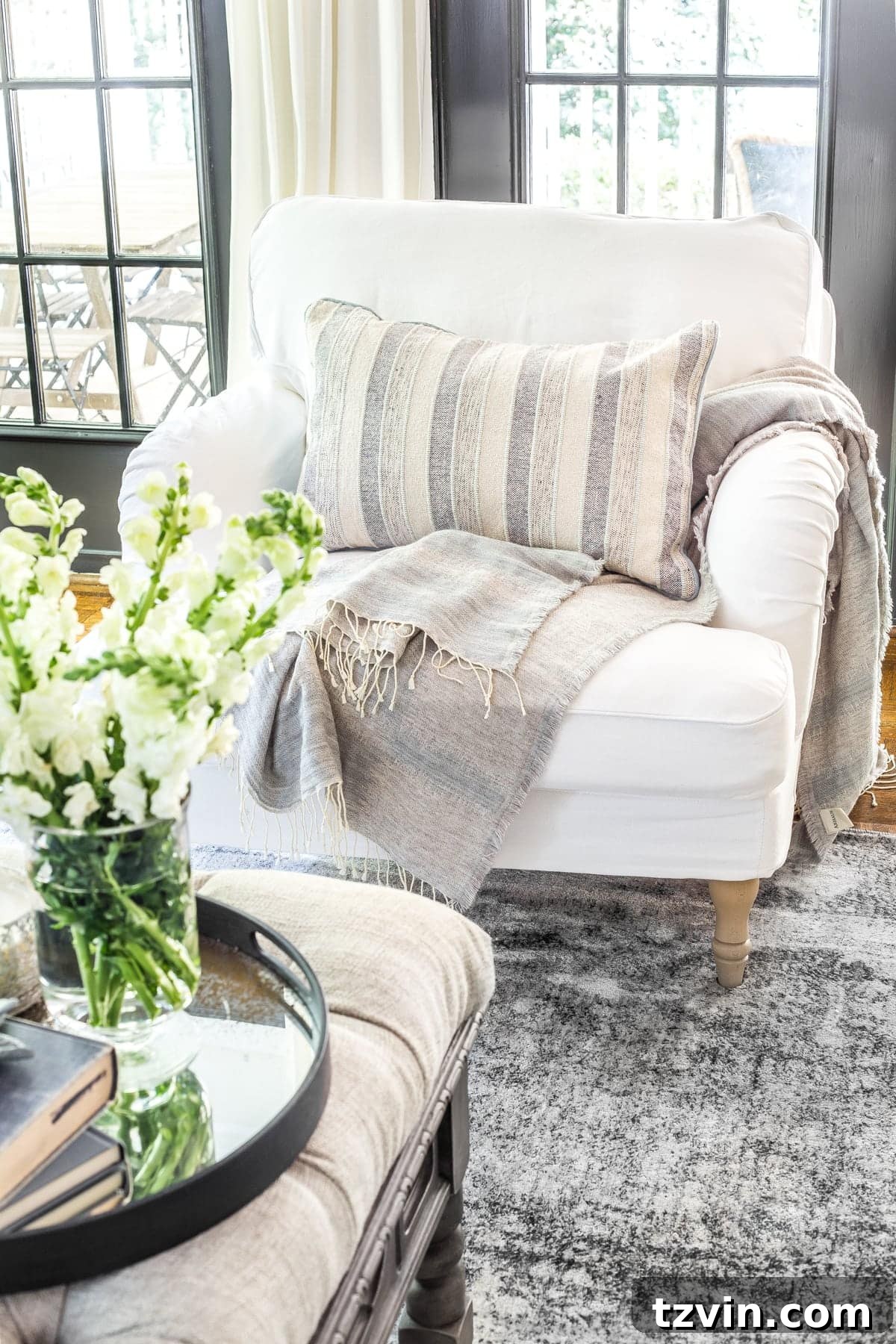 23 Smart Hacks to Make Your Small Room Feel Instantly Bigger 15 living room armchair with exposed legs to make a small room look bigger