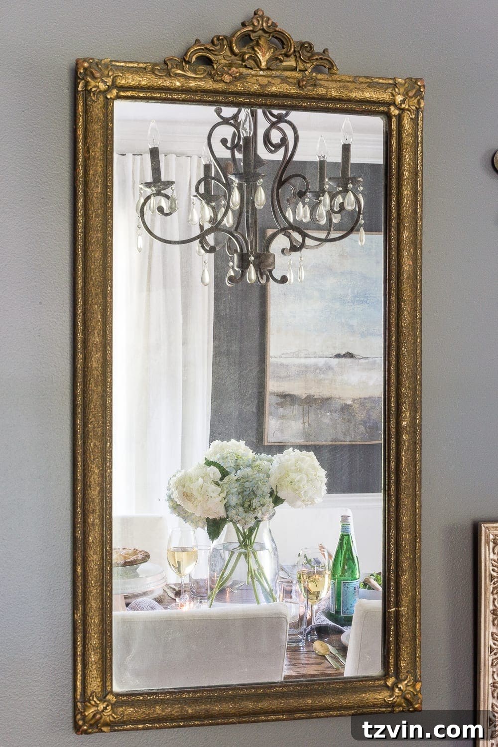 23 Smart Hacks to Make Your Small Room Feel Instantly Bigger 16 mirror in a dining room with a dining table reflection