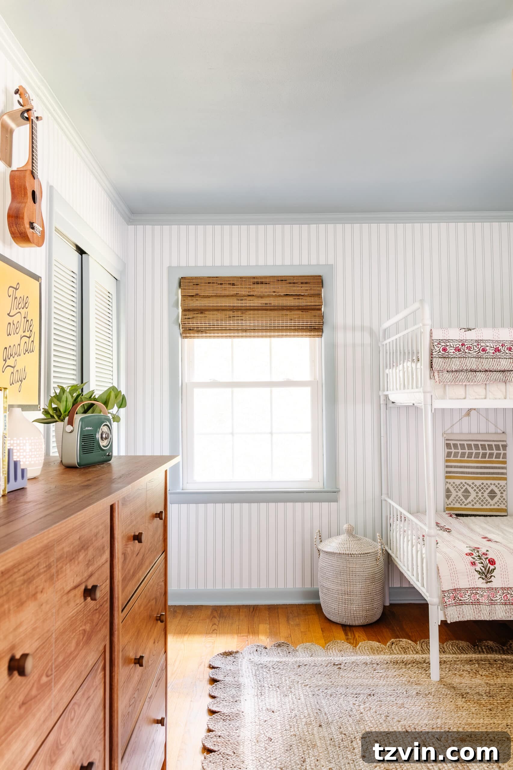 23 Smart Hacks to Make Your Small Room Feel Instantly Bigger 20 bunk room with vertical stripe wallpaper