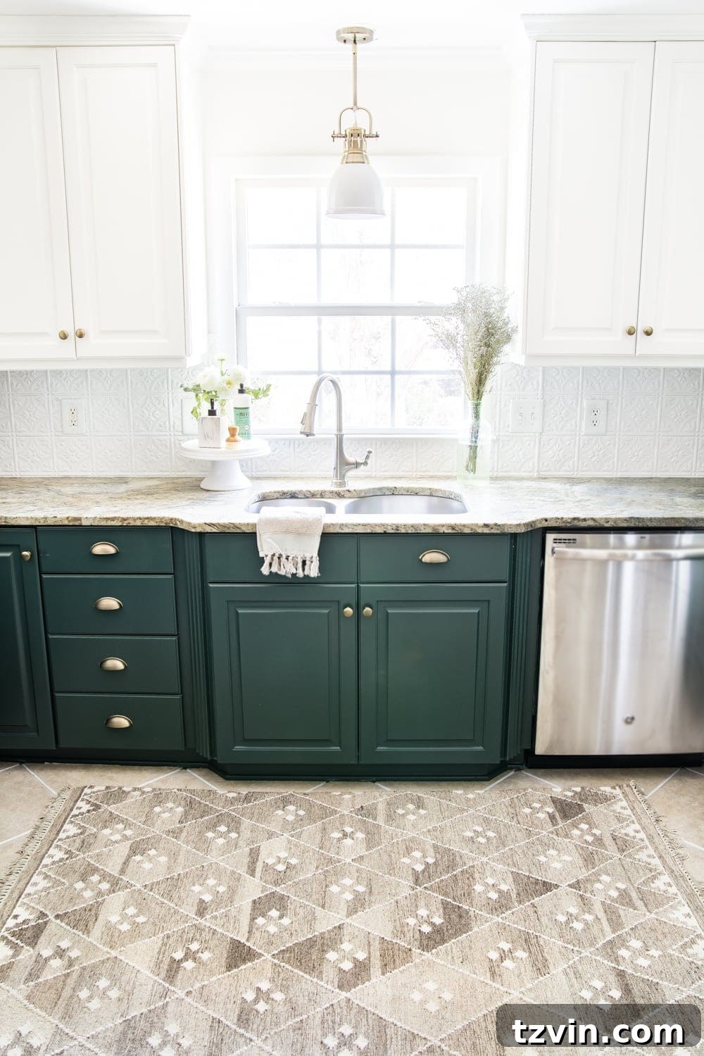 23 Smart Hacks to Make Your Small Room Feel Instantly Bigger 4 small kitchen with green lower cabinets, white upper cabinets, and white pressed tin backsplash