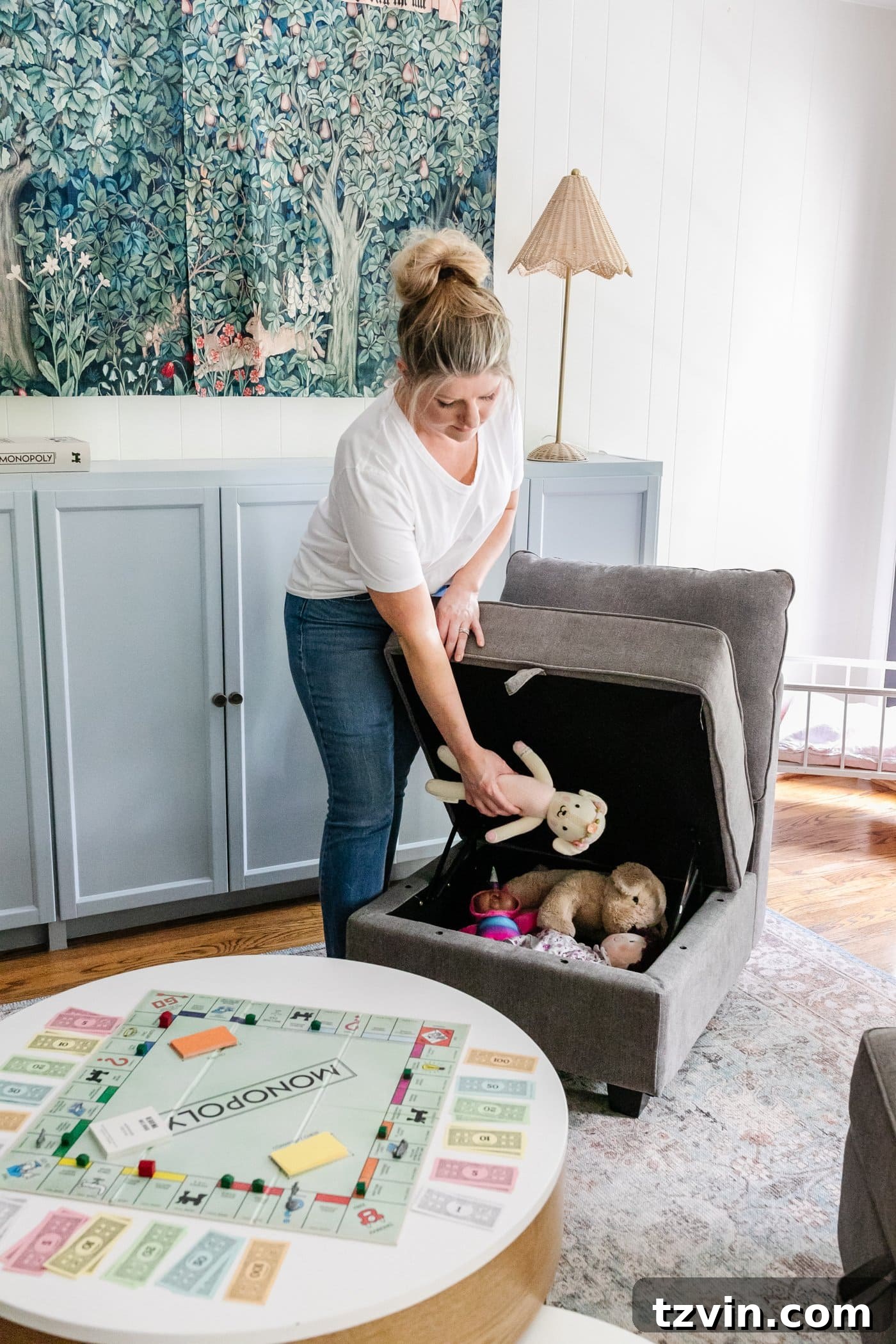 23 Smart Hacks to Make Your Small Room Feel Instantly Bigger 8 playroom toy storage chair, sky blue cabinets, and storage coffee table with board games