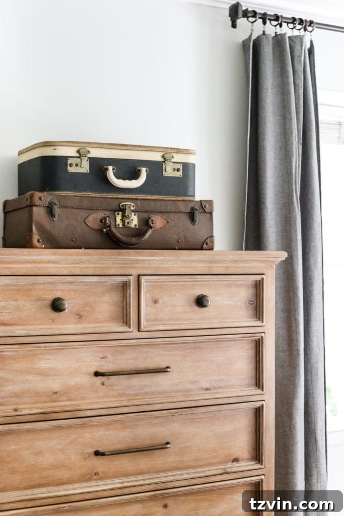 30 Must-Have Home Decor Treasures from Thrift Stores 21 Old suitcases, a must-have thrift store staple, used as decorative storage.