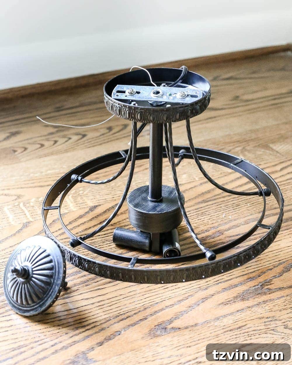 30 Must-Have Home Decor Treasures from Thrift Stores 6 Thrifted light fixture before makeover, showing potential for DIY.