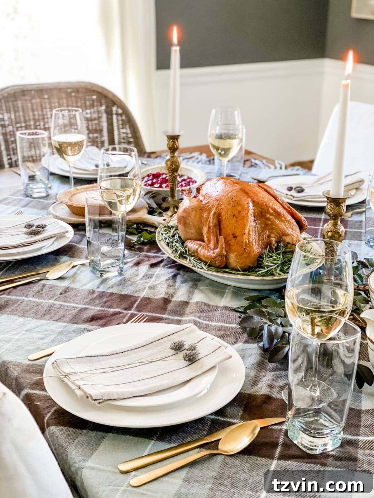 30 Must-Have Home Decor Treasures from Thrift Stores 58 Thanksgiving table decor using secondhand thrift store dishes, creating an eclectic tablescape.