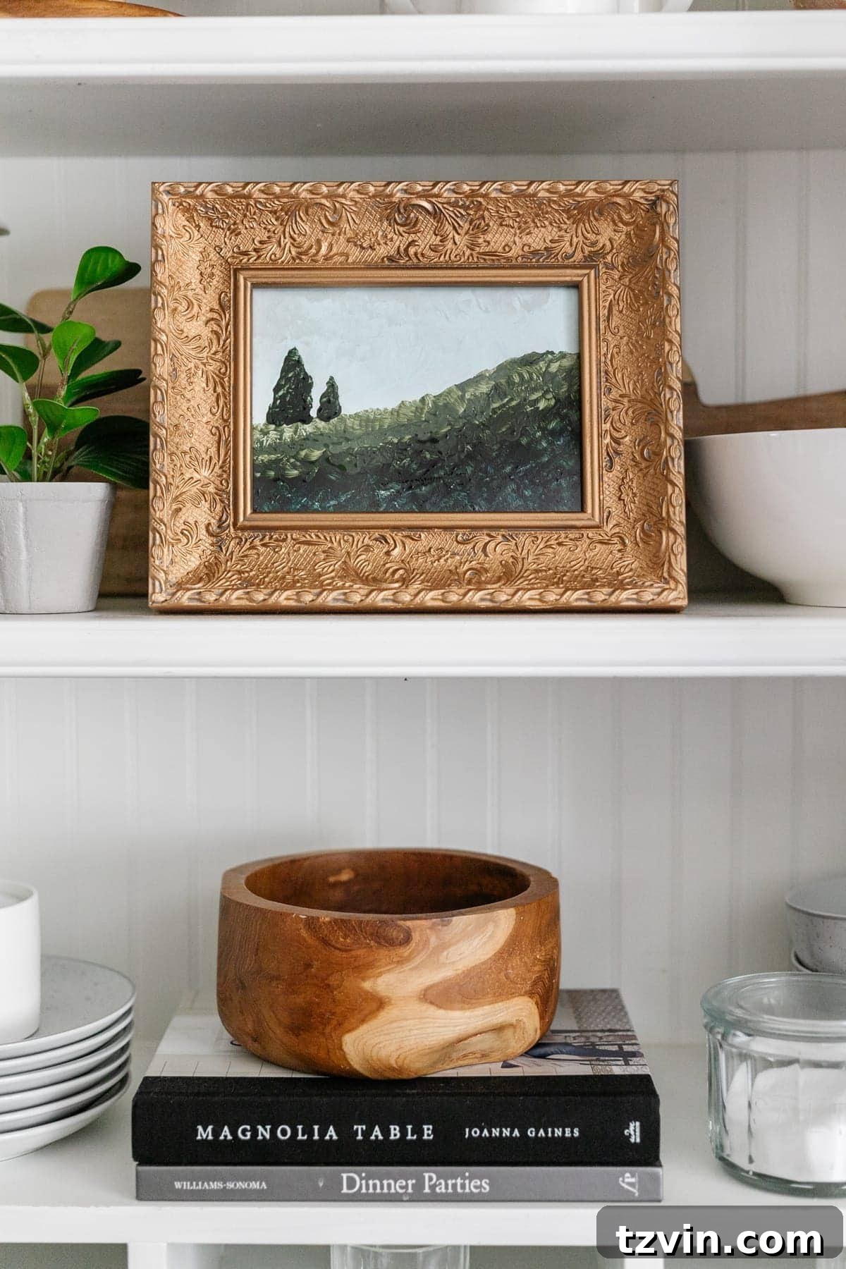 30 Must-Have Home Decor Treasures from Thrift Stores 9 Thrifted picture frame transformed into a unique painting, demonstrating DIY art possibilities.