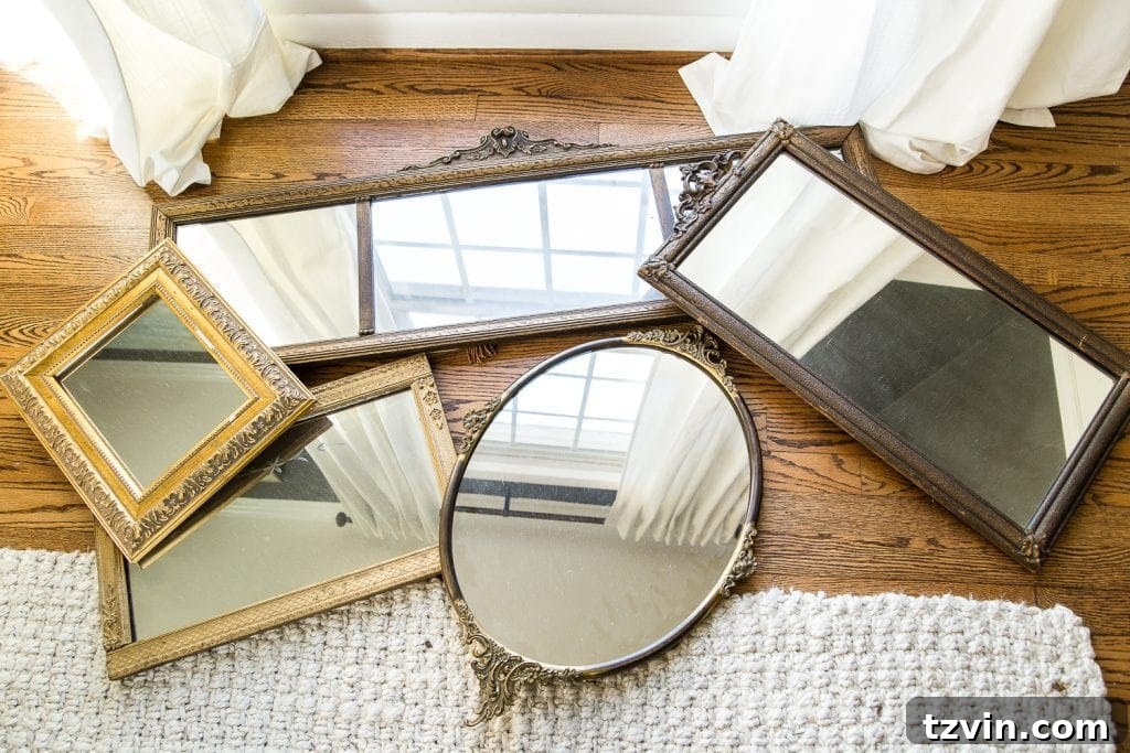 30 Must-Have Home Decor Treasures from Thrift Stores 10 A mirror gallery wall created from must-have thrift store staple mirrors.