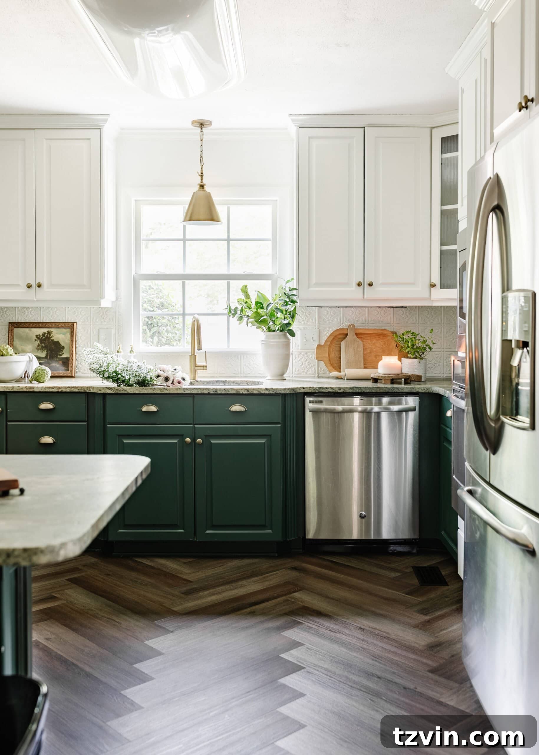 Cozy Cottagecore Kitchen Transformations for Less 5 green kitchen cabinets with herringbone LVP floors and brass hardware using cottagecore style decor on countertops