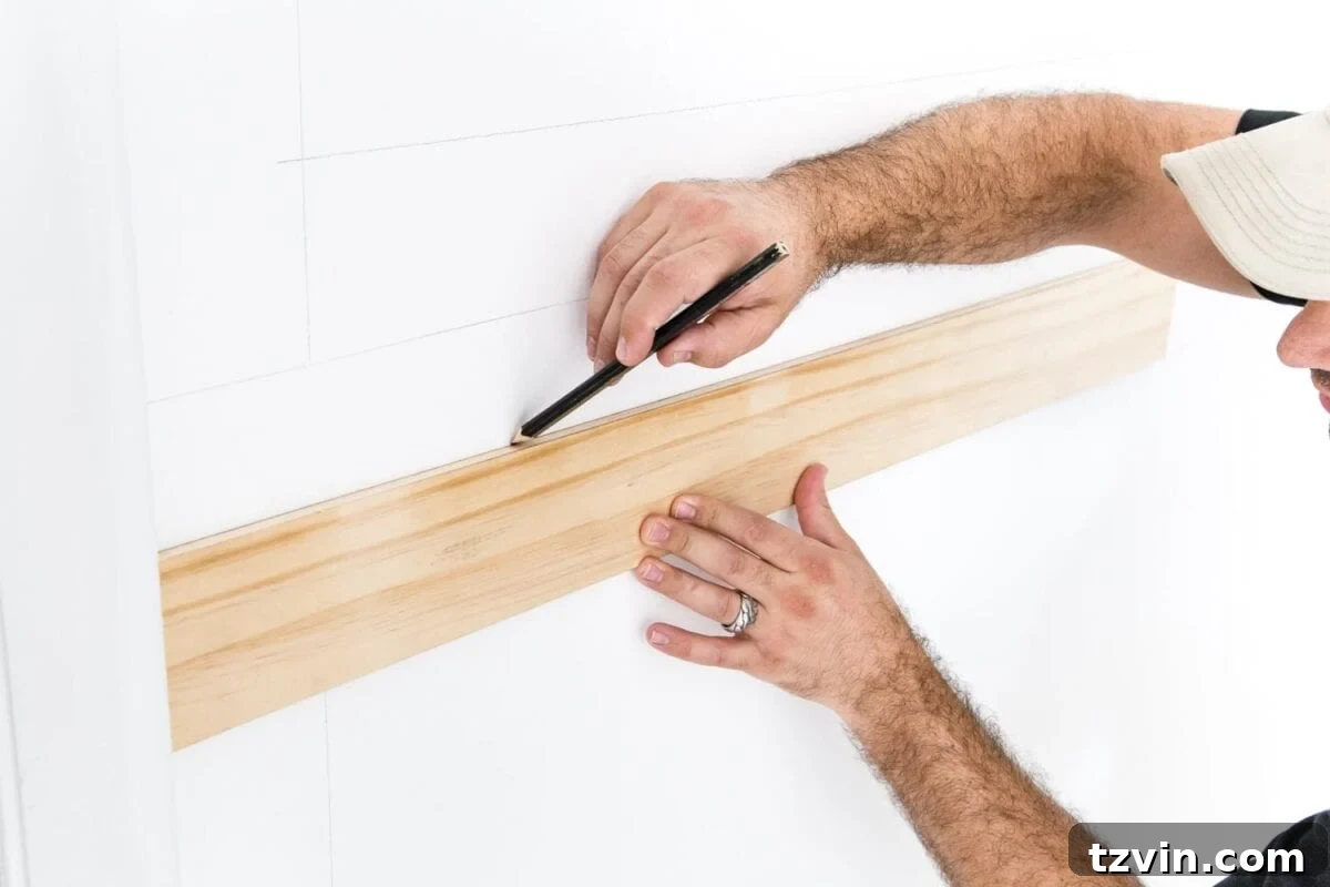 Frame Your Art: DIY Molding Mastery 7 Use a 3/8" x 4" board as a spacer to mark picture frame molding