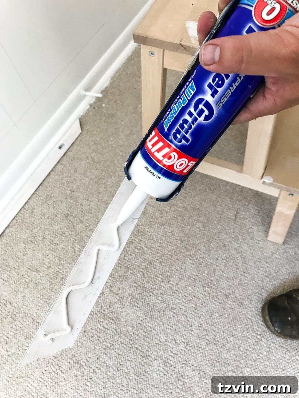 Frame Your Art: DIY Molding Mastery 10 use construction adhesive to make attaching picture frame molding to walls easier