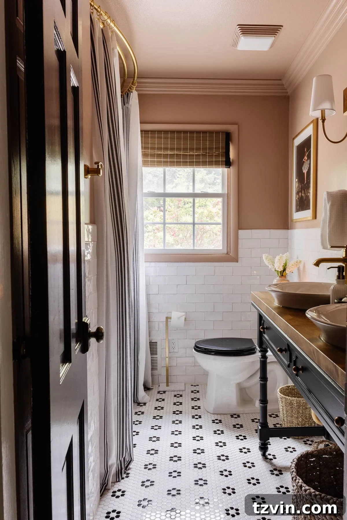 pink bathroom painted Behr Postmodern Mauve, showcasing its cozy and warm blush tone