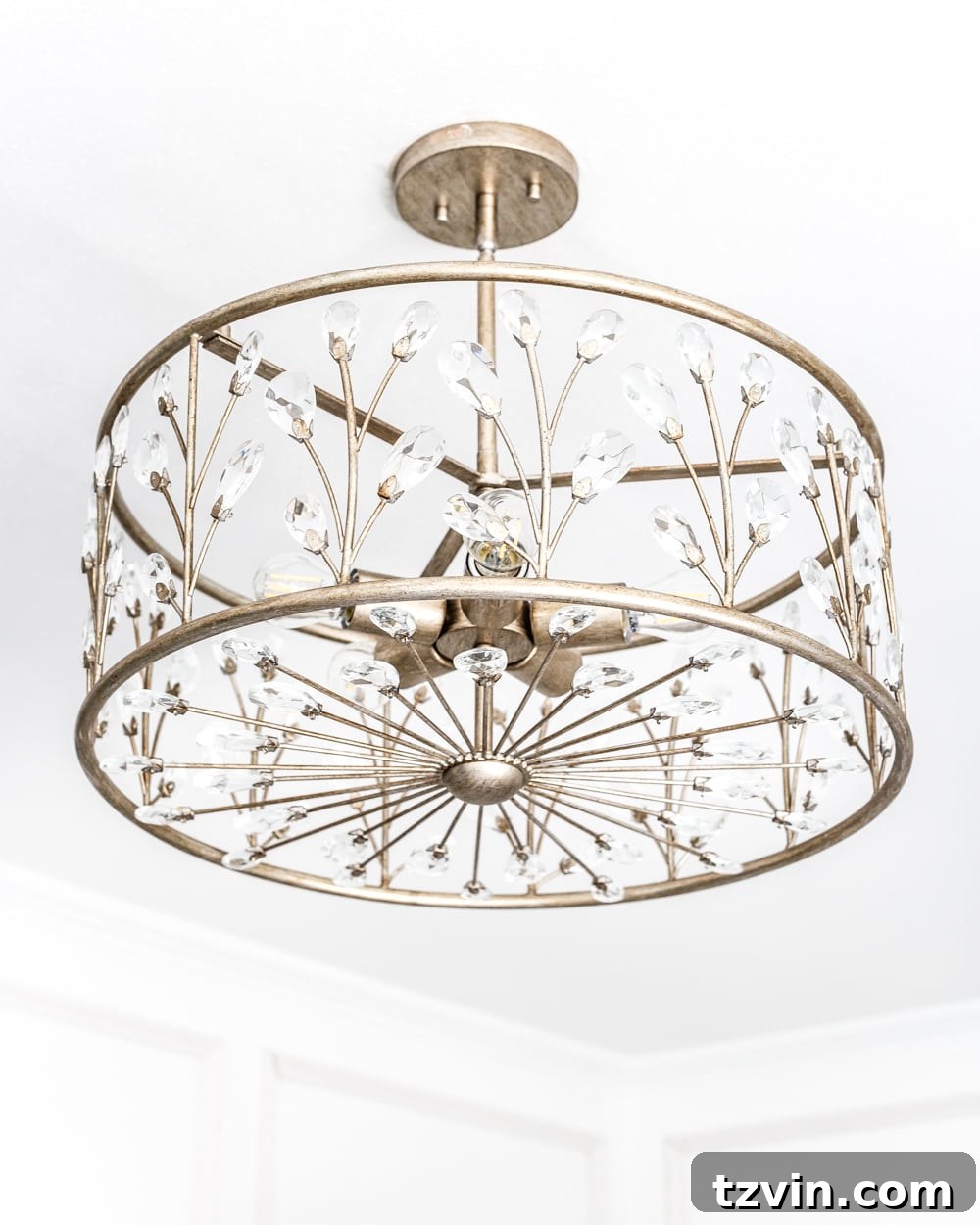 Elevating Nursery Lighting 6 A feminine, vintage, glam lighting update for a baby girl's nursery makeover. #nurserylighting #lightfixture #glamdecor #vintagedecor