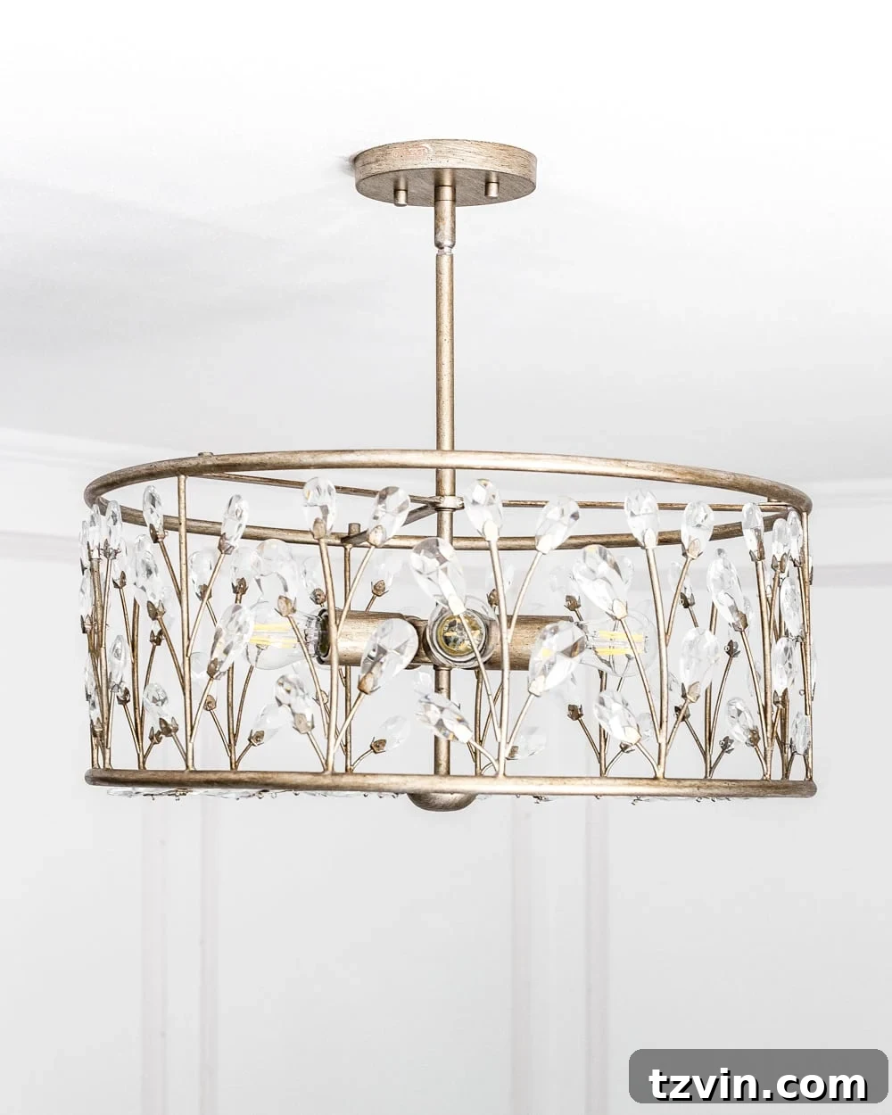 Elevating Nursery Lighting 8 A feminine, vintage, glam lighting update for a baby girl's nursery makeover. #nurserylighting #lightfixture #glamdecor #vintagedecor