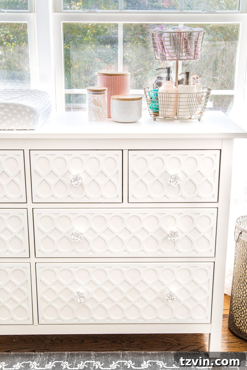 Elevated IKEA Hemnes Dresser Makeover 16 Organized IKEA Hemnes dresser drawers in a baby nursery, showing efficient storage