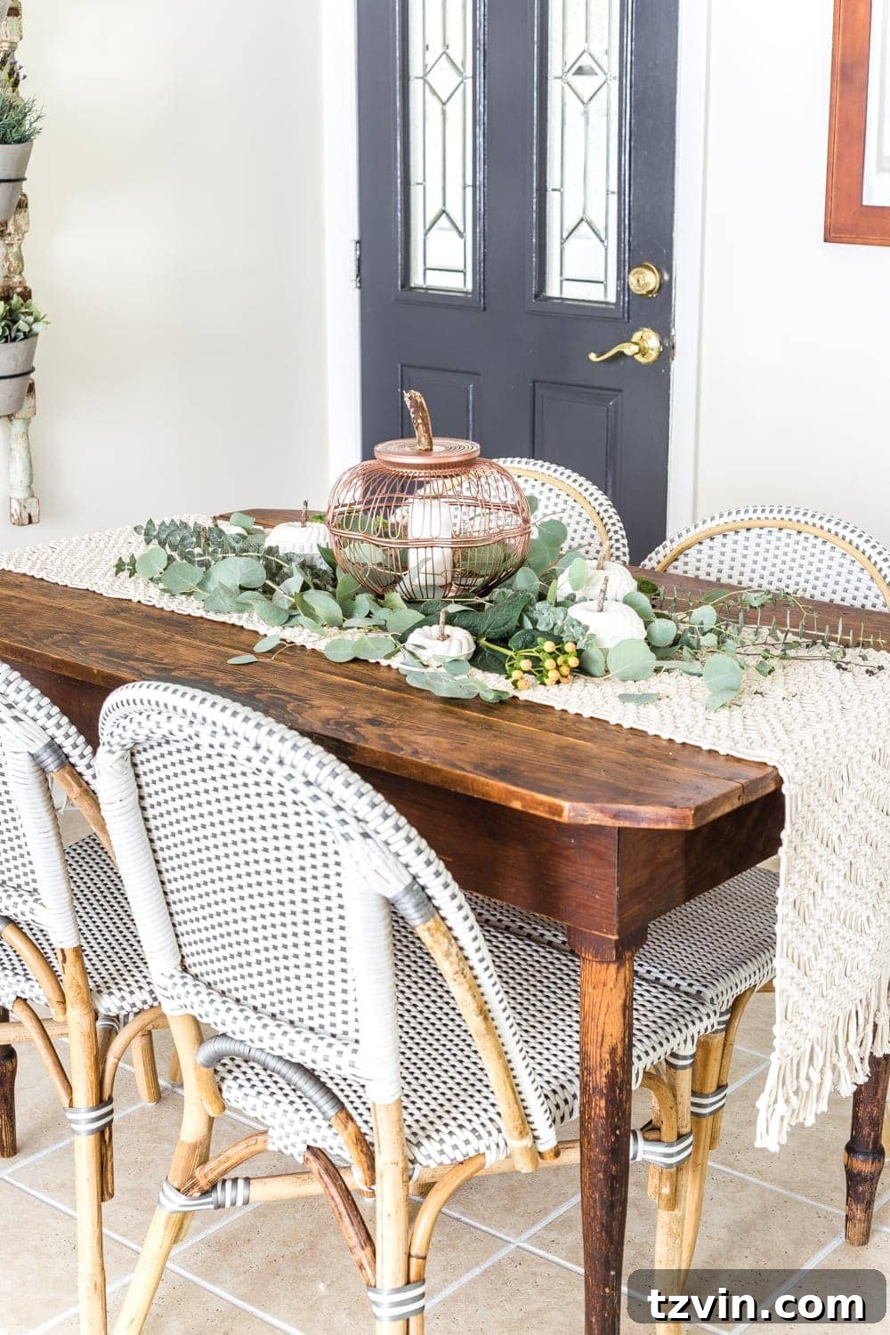 fall centerpiece using thrifted wire bread baskets and DIY craft pumpkins