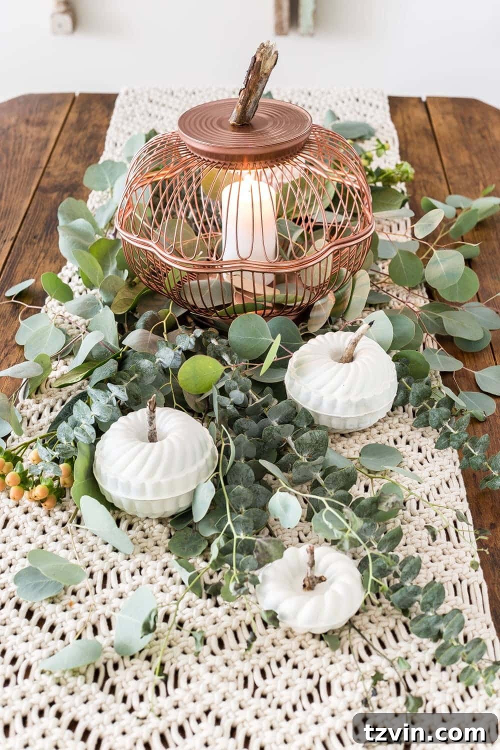 DIY pumpkin lantern using thrifted wire bread baskets and craft pumpkins using mini bundt pan Jello molds