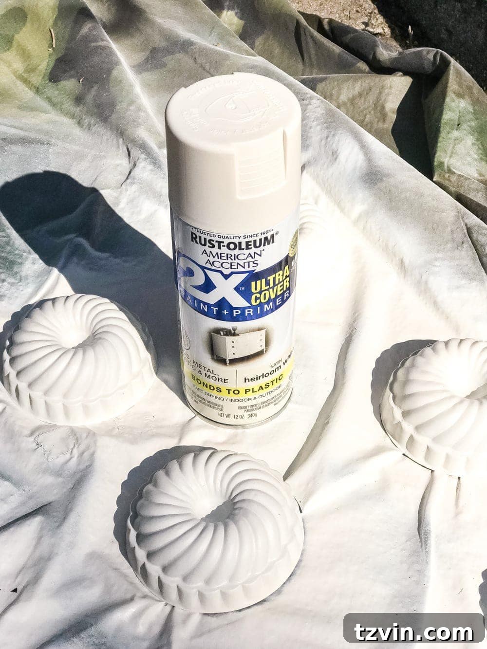 white spray painted mini bundt pan Jello molds to make craft pumpkins