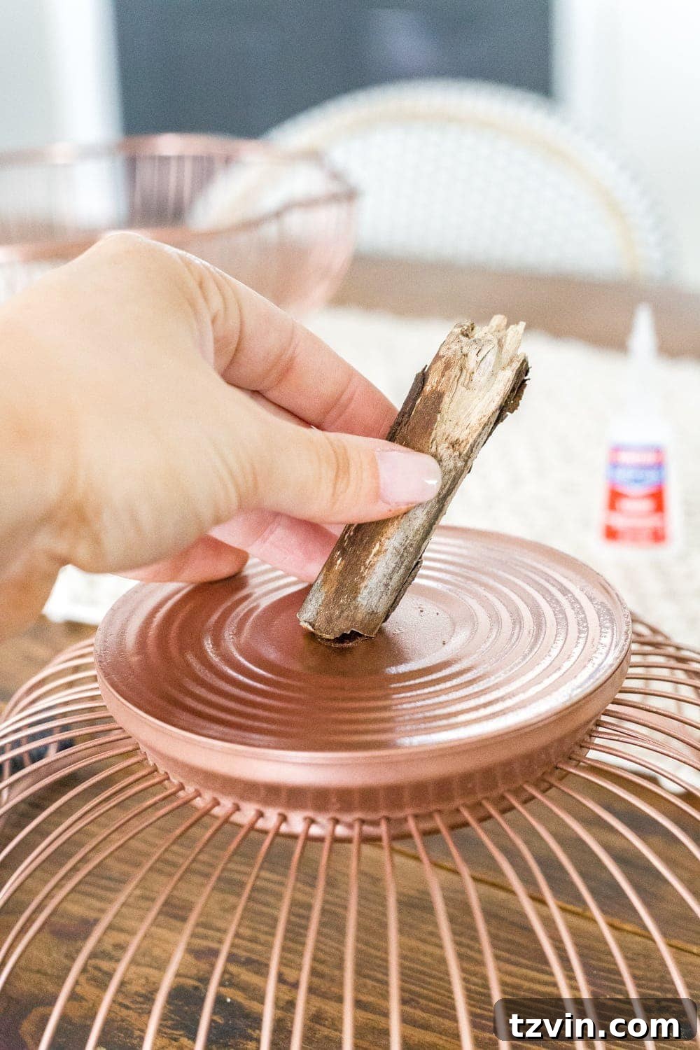 DIY pumpkin using wire bread baskets and sticks from your yard