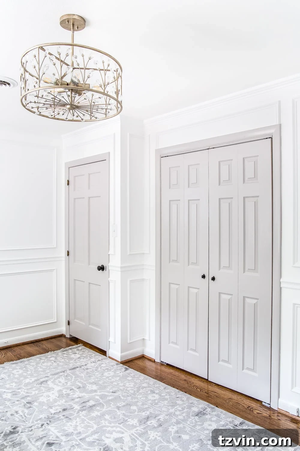 gray painted interior doors with white walls in a nursery room