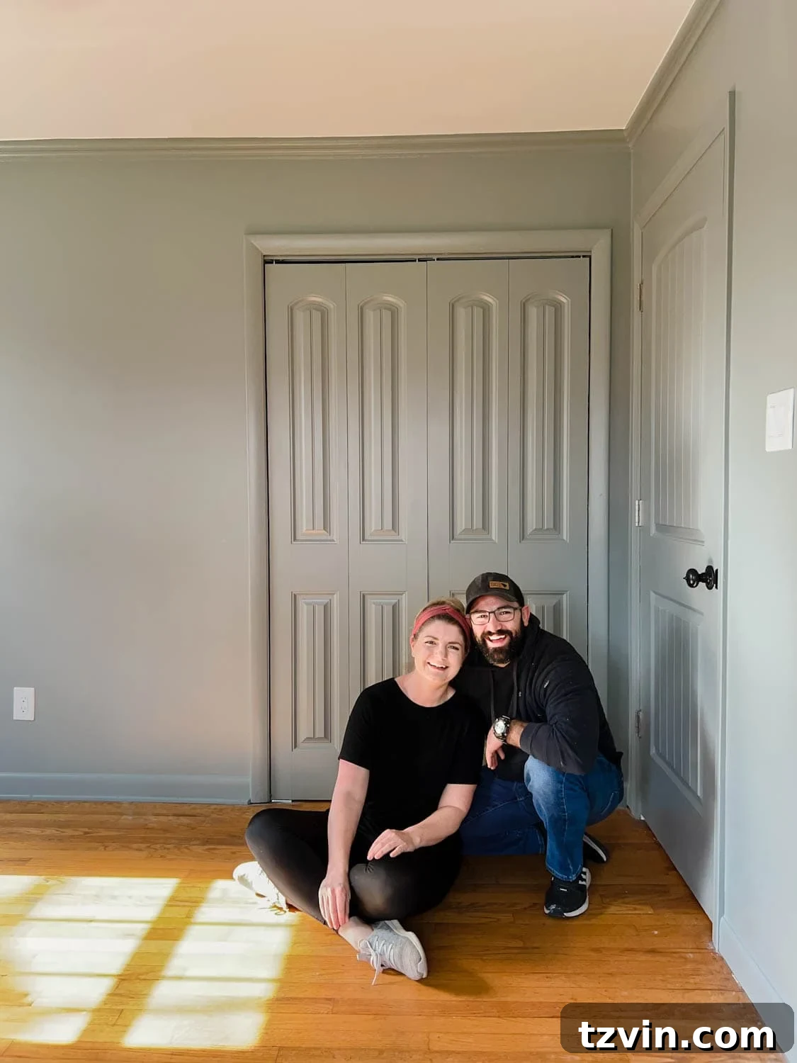 bedroom doors painted Sherwin Williams Evergreen Fog matching the walls
