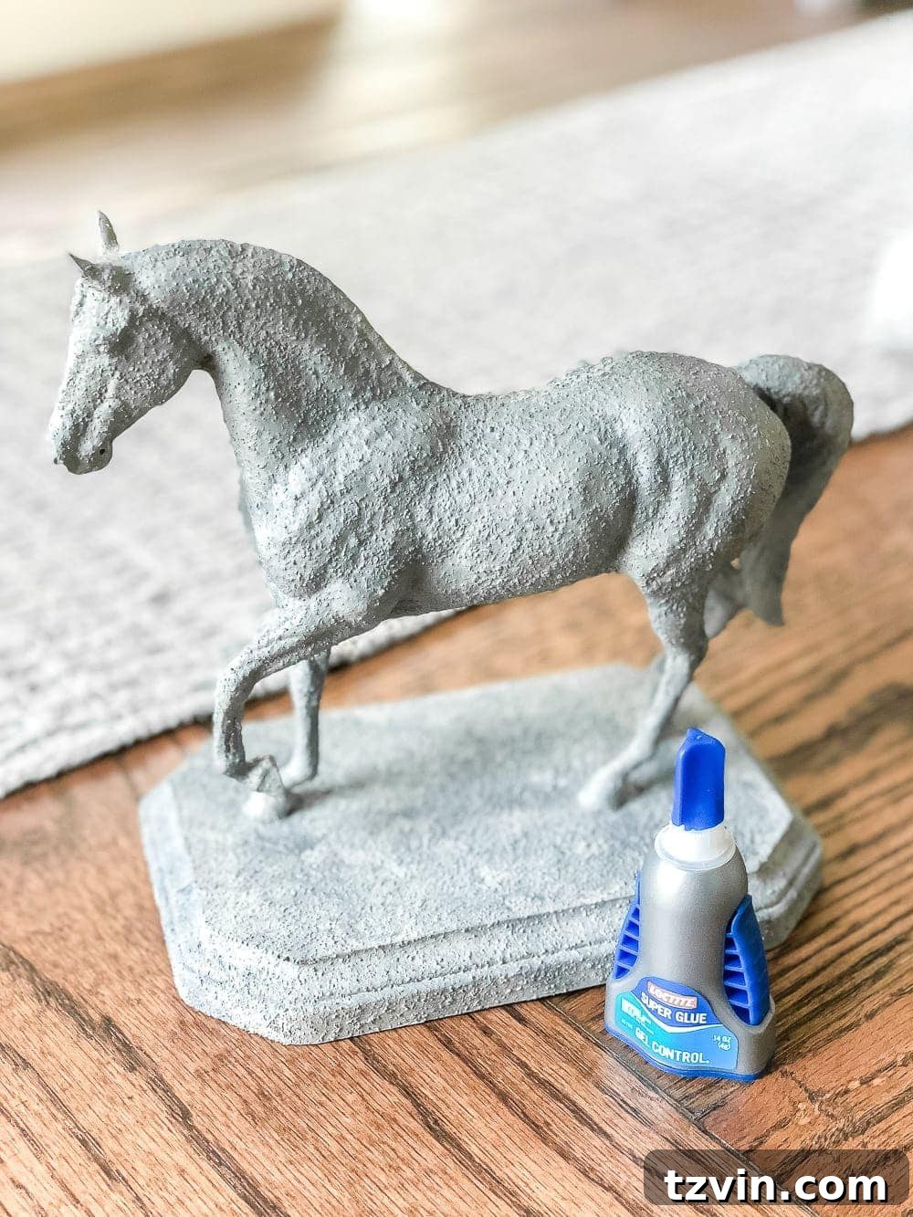 Homemade Concrete Horse Statue 6 Adding dark gray paint to create dimension