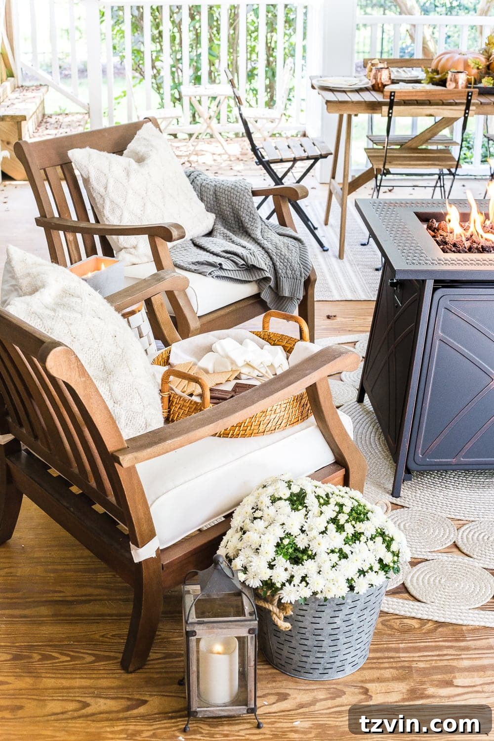 Fall Porch Perfection: Crafting Your Cozy Outdoor Oasis 5 Cozy fall back porch with neutral outdoor furniture and fire pit