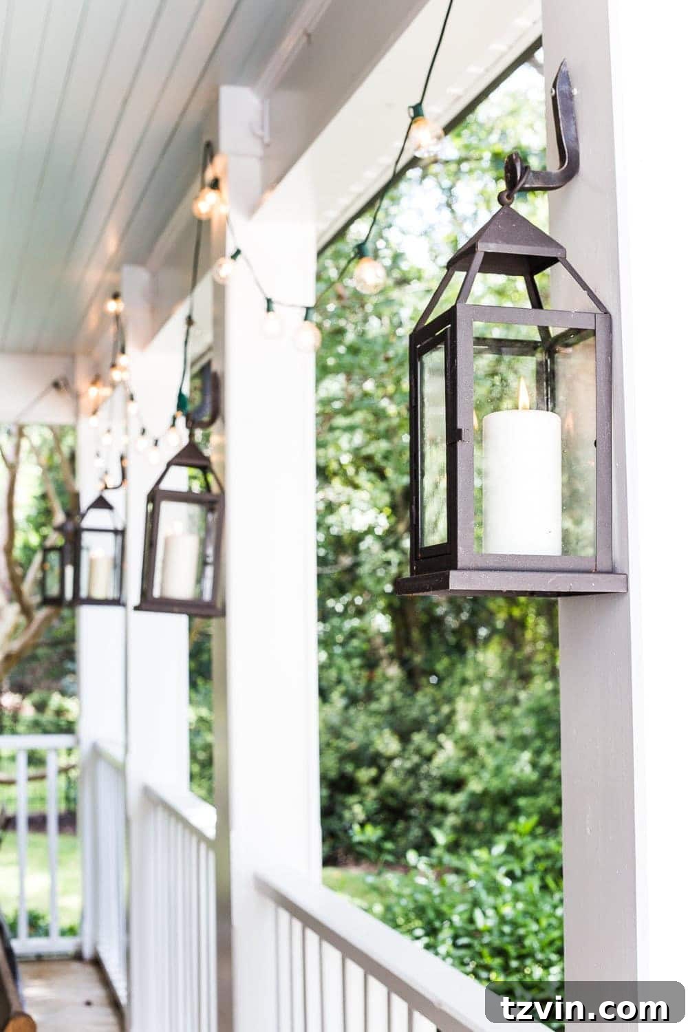 Fall Porch Perfection: Crafting Your Cozy Outdoor Oasis 8 cozy fall porch with string lights and outdoor lanterns