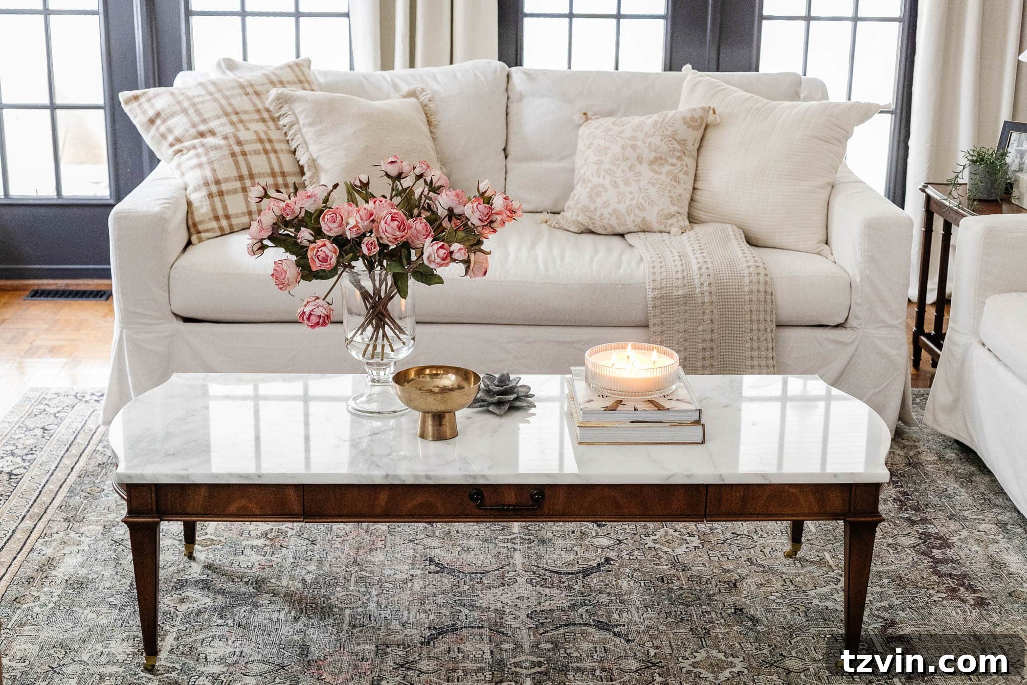 Decorate Smarter: Dodge Common Design Disasters 16 Mix and match throw pillows on a sofa in a living room