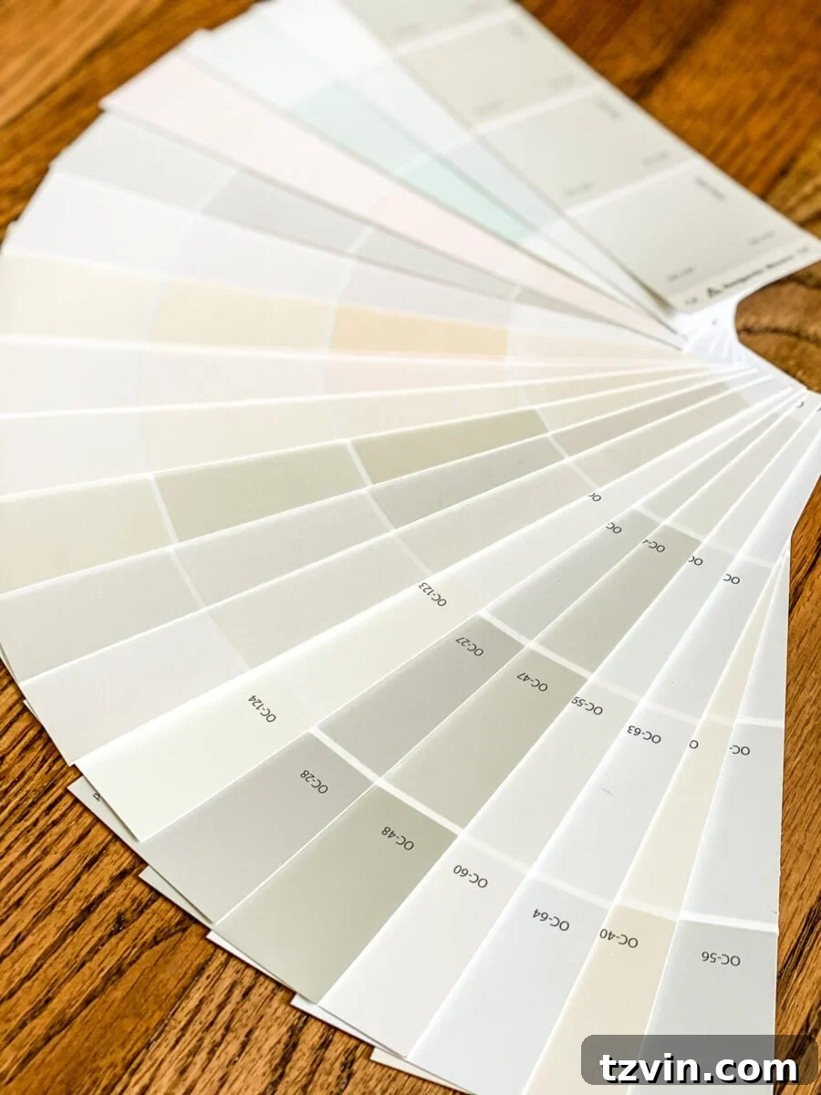 Decorate Smarter: Dodge Common Design Disasters 3 Paint color samples displayed on a wall for testing