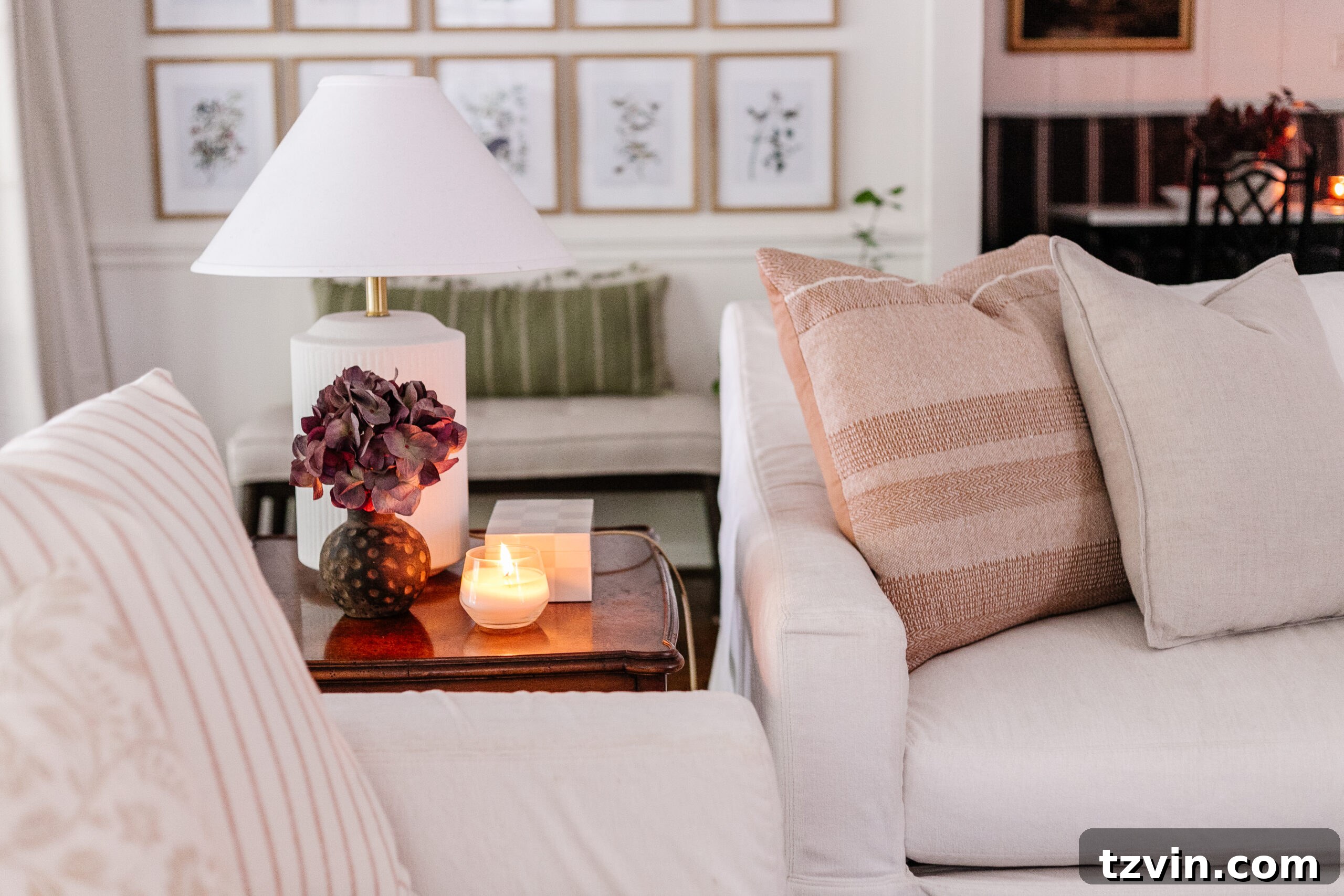 Decorate Smarter: Dodge Common Design Disasters 6 Stylishly decorated end table in a living room beside a sofa