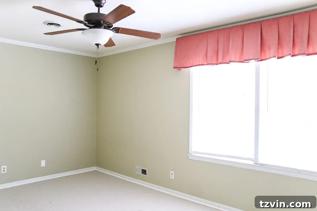 Blossoming Dreams: White Floral Nursery Reveal 2 Before photo of an old spare bedroom that will become a nursery.