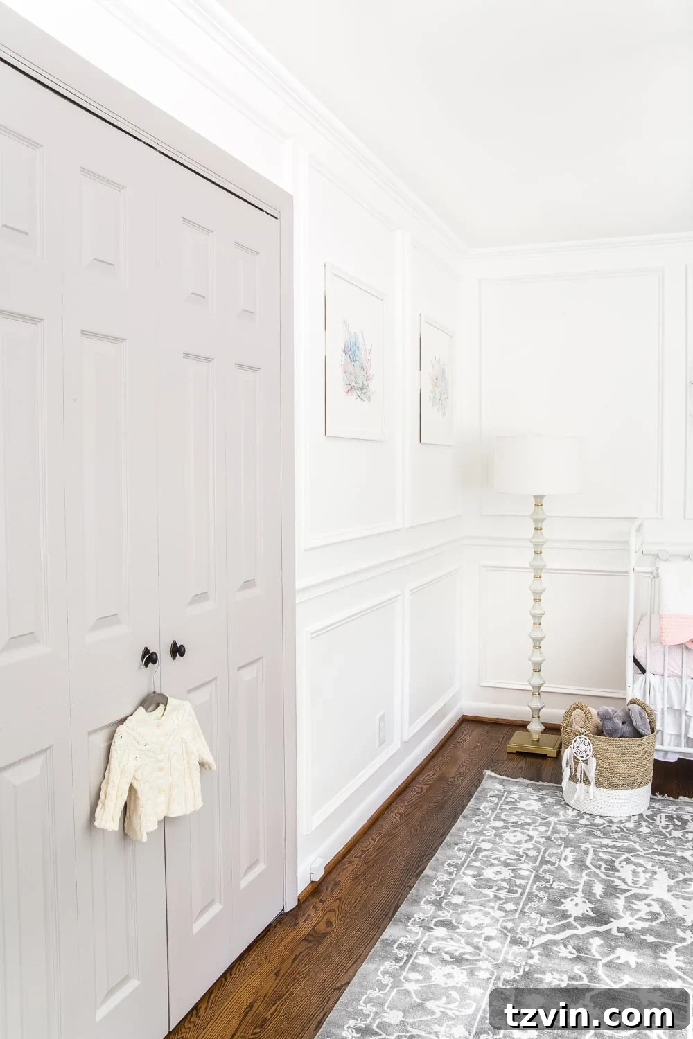 Blossoming Dreams: White Floral Nursery Reveal 15 Closet doors with knobs incorrectly installed in the white nursery.