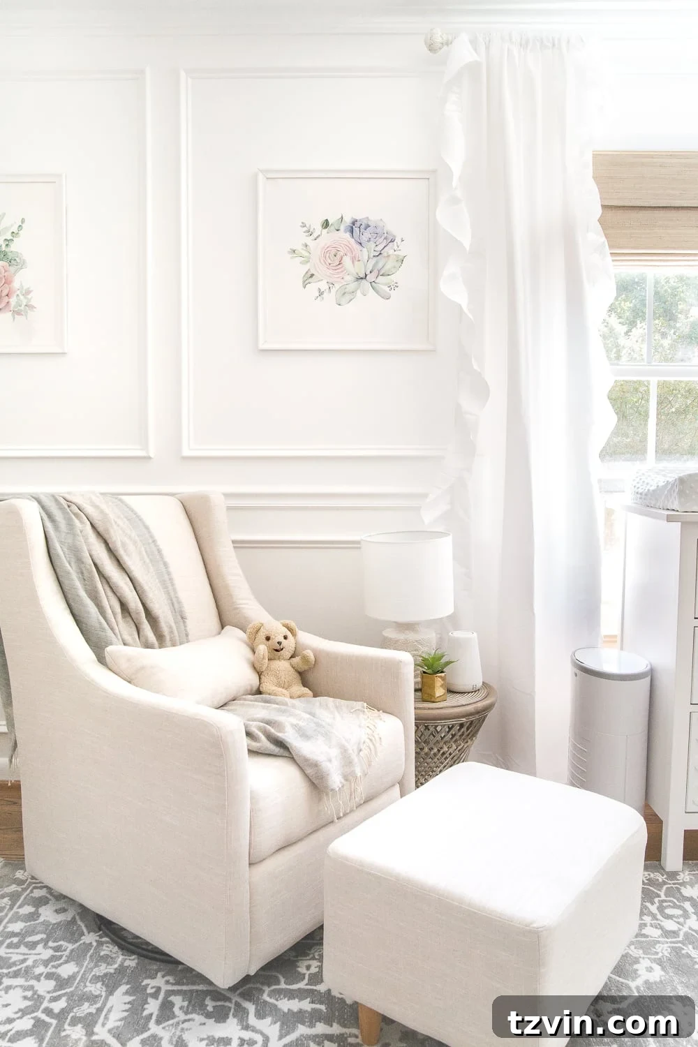 Blossoming Dreams: White Floral Nursery Reveal 16 Comfortable glider in the white nursery.