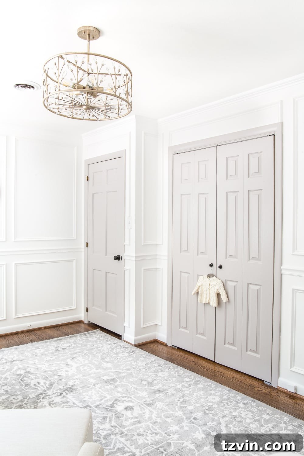 Blossoming Dreams: White Floral Nursery Reveal 9 After photo of the painted closet doors in the white nursery.